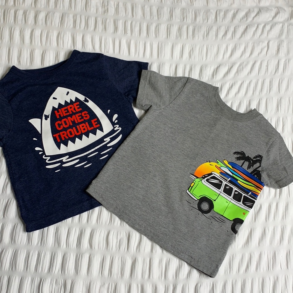 Here comes trouble tee driving into the sunset